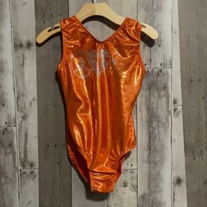Go For The Gold gymnastics metallic orange leotard